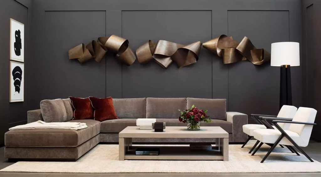 Abstract bronze ribbon sculpture as statement decor for walls in a modern living room