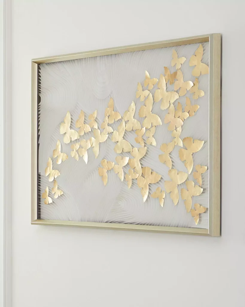 Angled gold-leaf Butterfly Wall art panel framed in brushed metal
