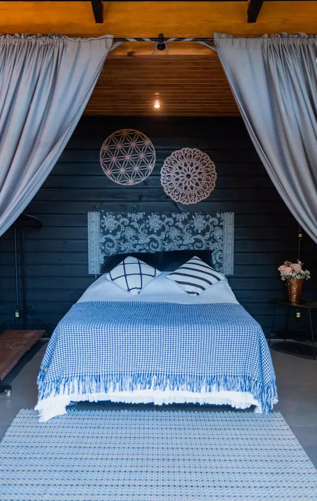 Blue Curtained Canopy Bed Nook With Cozy Layers