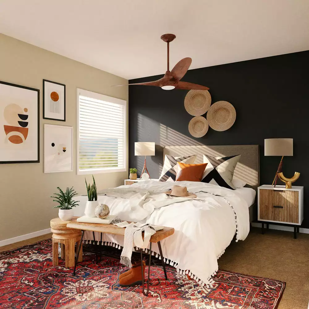 Boho bedroom decor with black accent wall, woven seagrass wall art and red Persian rug
