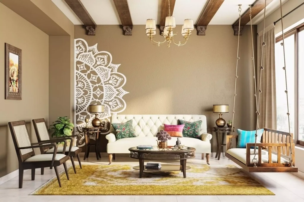 Boho living room with white sofa, swing chair, and mandala wall decal on accent wall