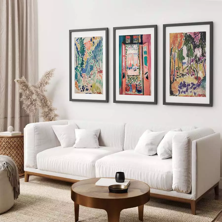 Colorful Framed Wall Art Decor Trio Above White Sofa