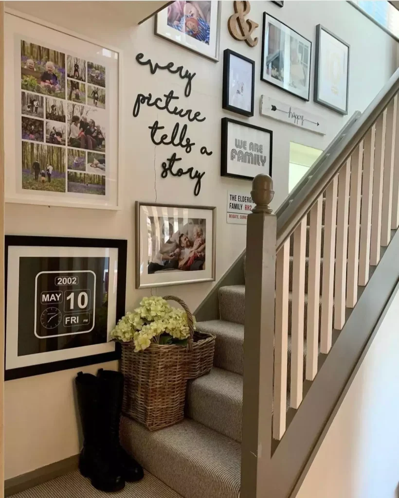 Cursive wall quote paired with a framed photo collage on a staircase wall