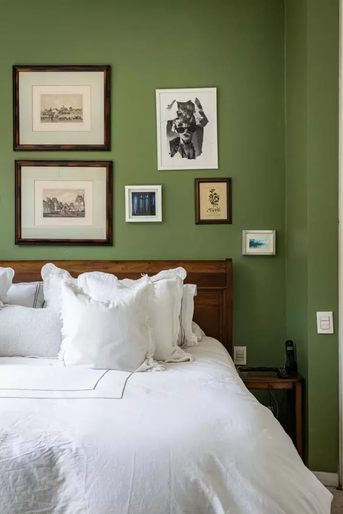 Deep Green Behind The Bed Wall With Layered Gallery Frame Decor