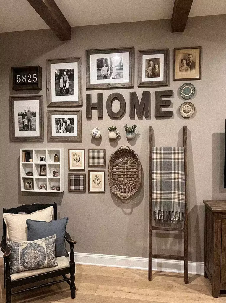 Farmhouse Wall Gallery With A Wooden HOME Sign, Framed Family Portraits, Plaid Art Squares, Decorative Plates, And A Blanket Ladder Beside An Upholstered Chair