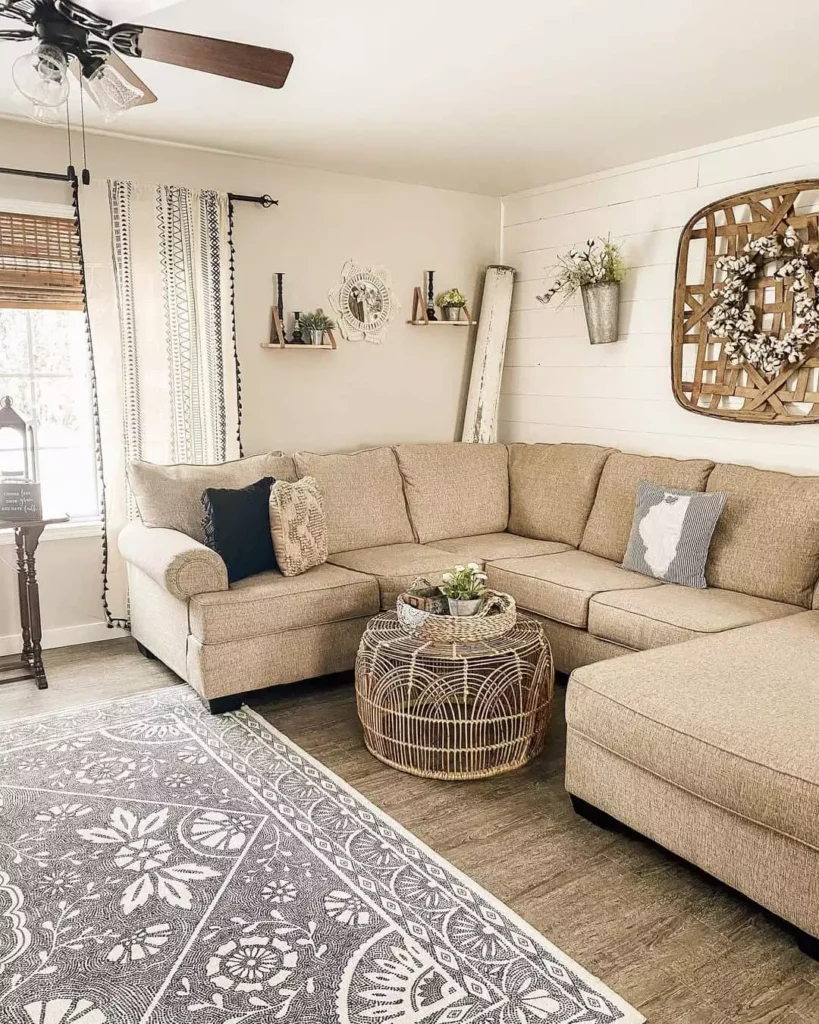 Farmhouse living room with cotton wreath and shiplap wall decor