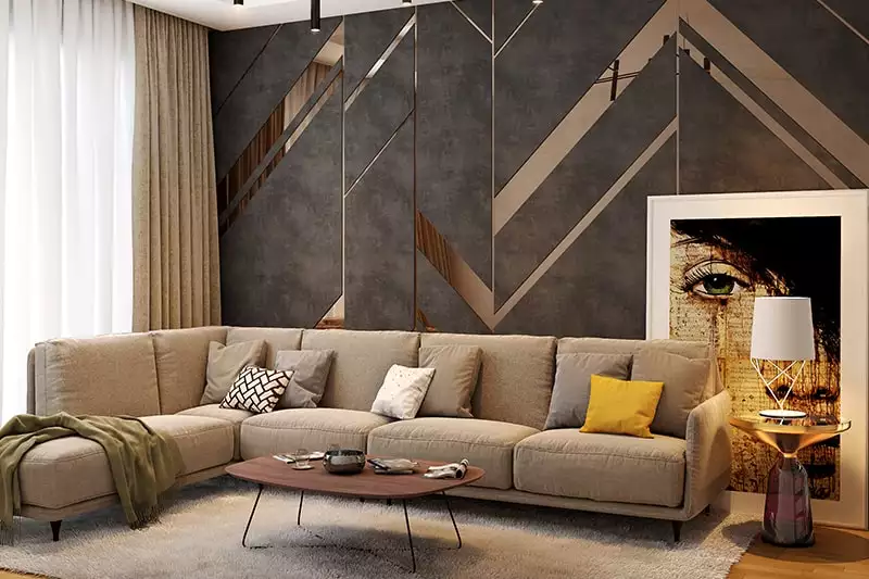 Geometric mirrored panel accent wall behind beige sectional sofa