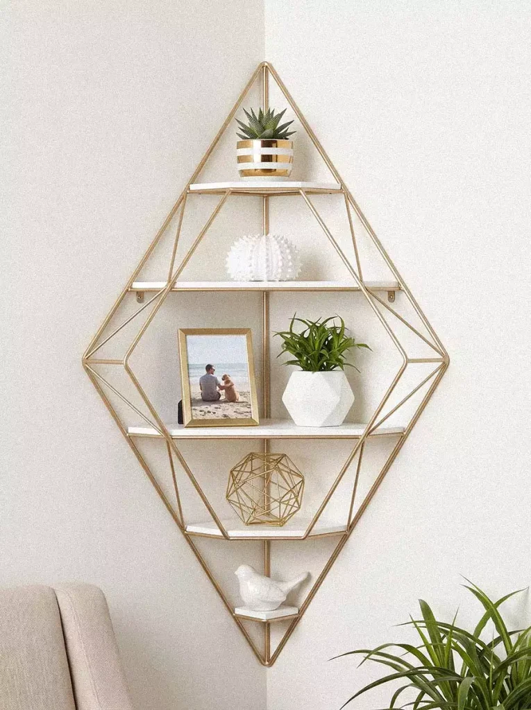 Gold Diamond Wall Shelf Decor Paired With A Trailing Plant