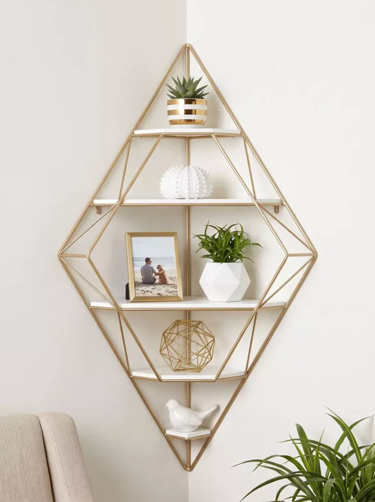 Gold geometric Corner Wall Decor with diamond shelf, succulents, framed photo and white ceramic decor
