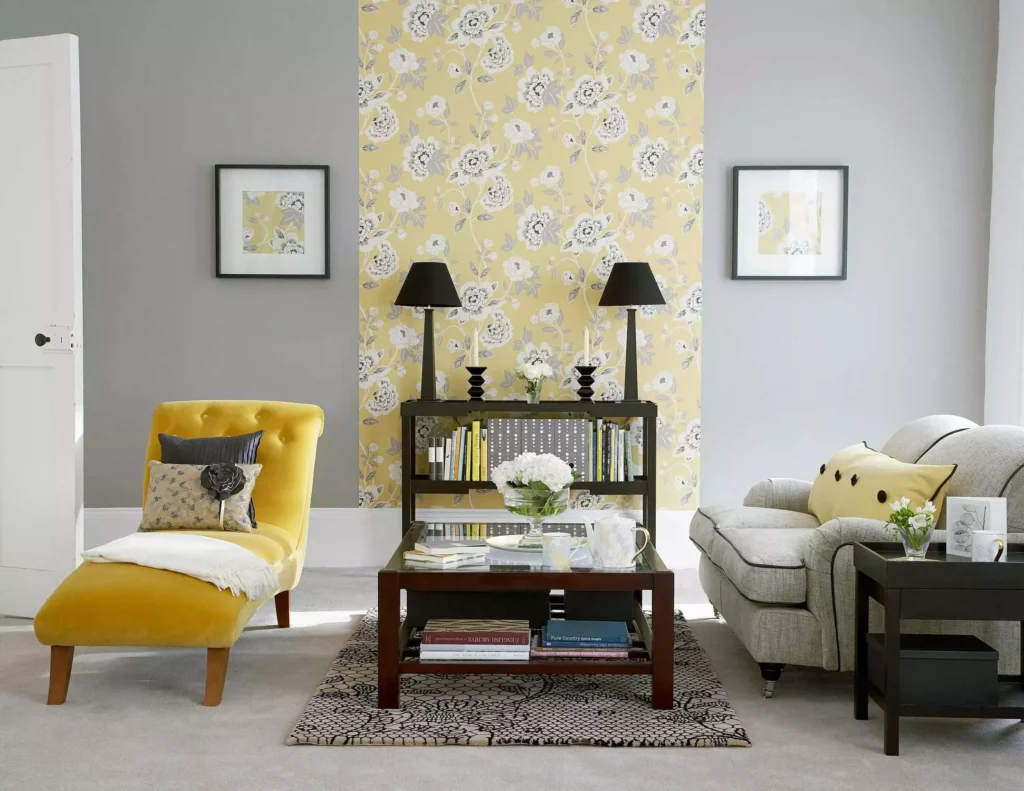 Grey living room walls with mustard floral accent panel, chaise chair and dark furniture