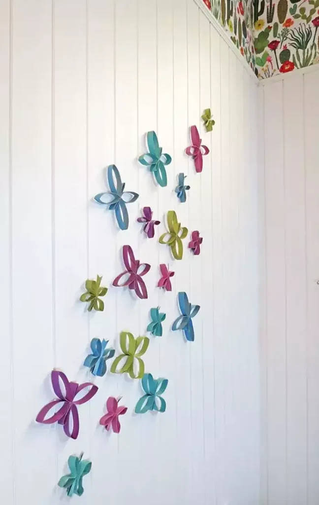 Handmade toilet-roll Butterfly Wall craft in teal, plum and olive tones