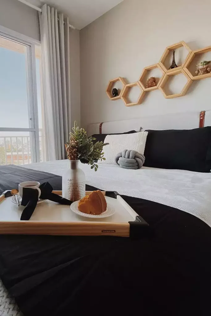 Hexagon Wood Shelves As Small Bedroom Wall Decor Above A Black And White Bed