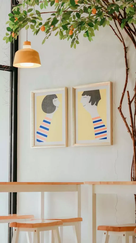 Illustrated Portrait Wall Art Decor Duo Under Pendant Light