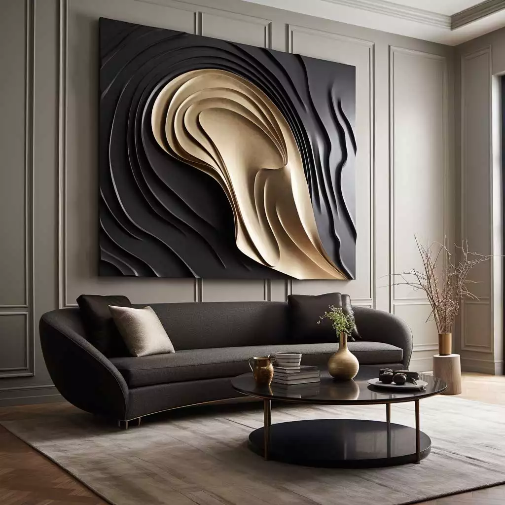 Large sculptural black and gold wall art above curved sofa in living room