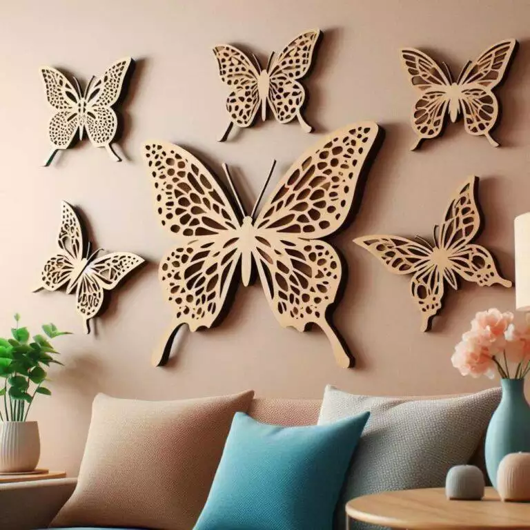Laser-cut wooden Butterfly Wall cluster above dusty-rose accent pillows