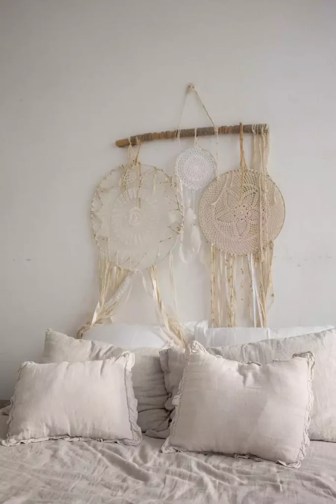 Macrame Wing Wall Decor Above Cream Pillows