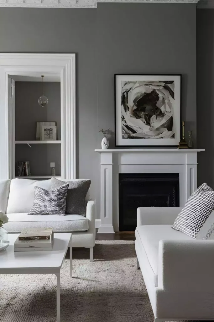 Minimalist grey wall living room with white fireplace mantel and abstract black and white art