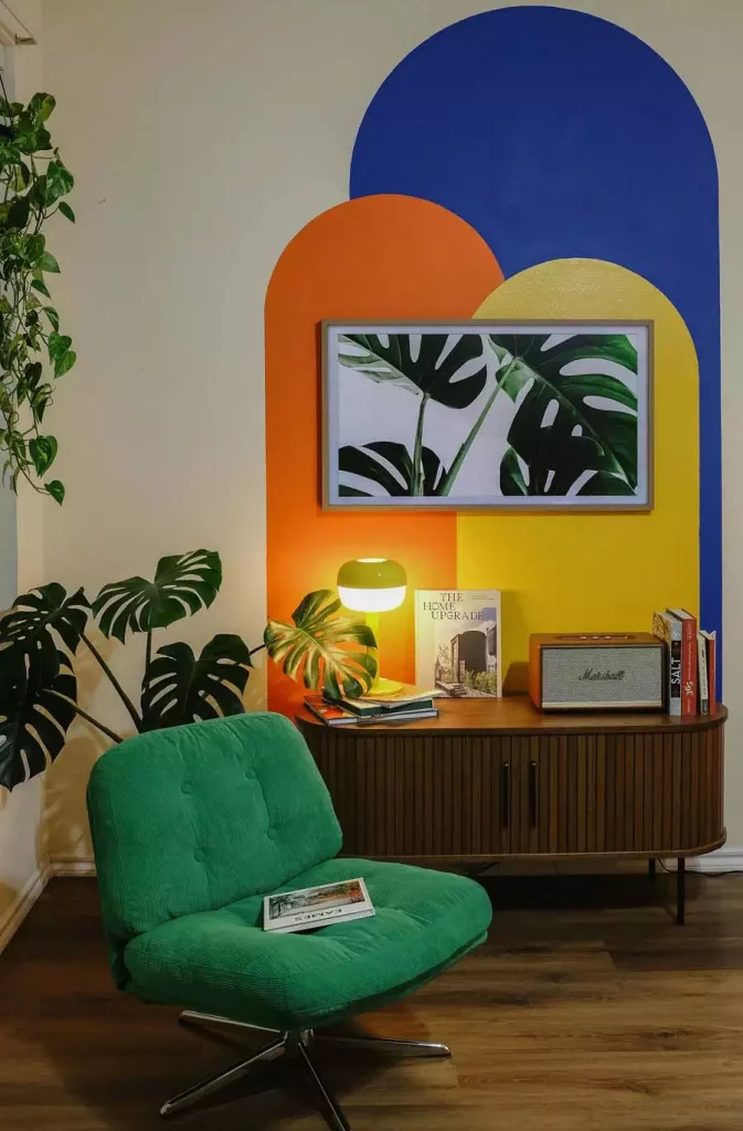 Monstera Leaf Wall Art Decor Framed Against Colorful Arch Mural