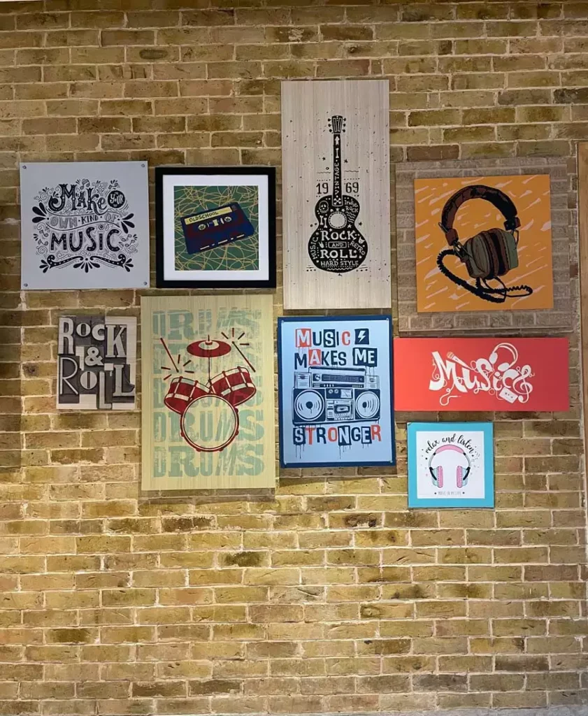 Music Themed Typography Wall Decor On Exposed Brick