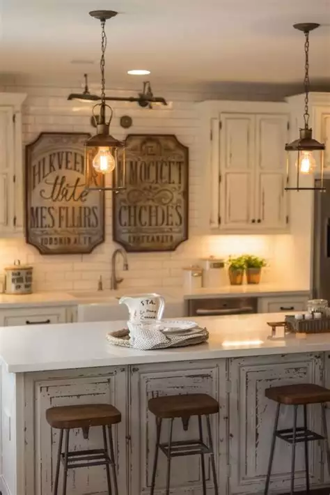 Pair of vintage farmhouse signs on a white subway tile kitchen wall