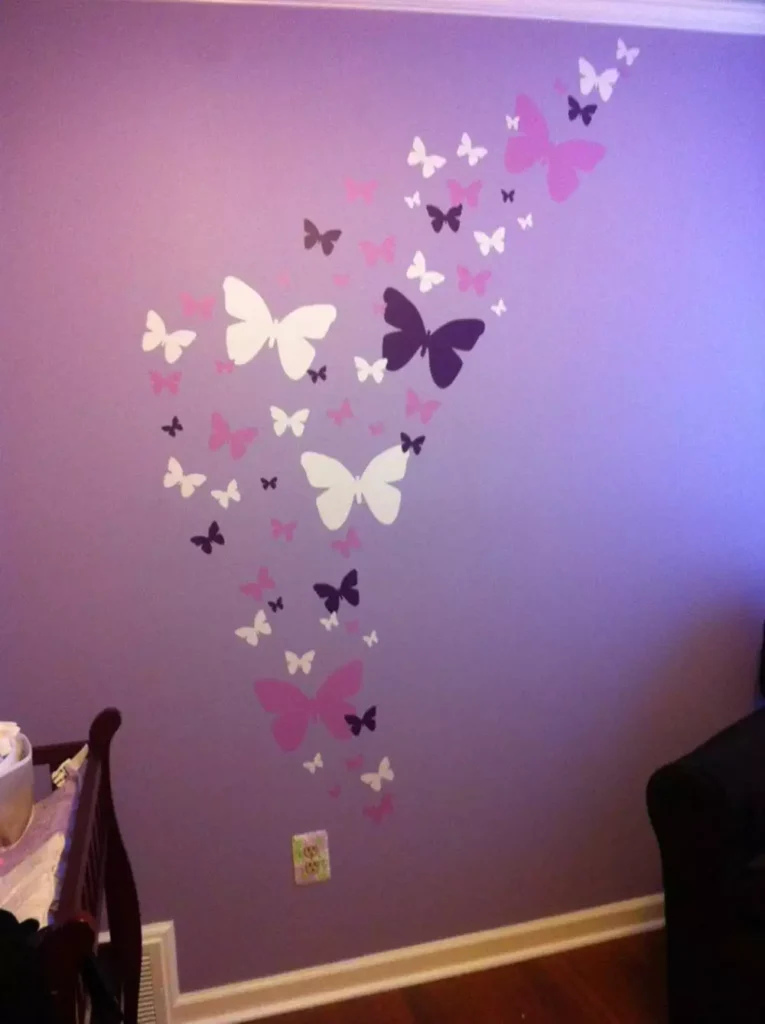 Purple, pink and black decals swirling up a lavender Butterfly Wall