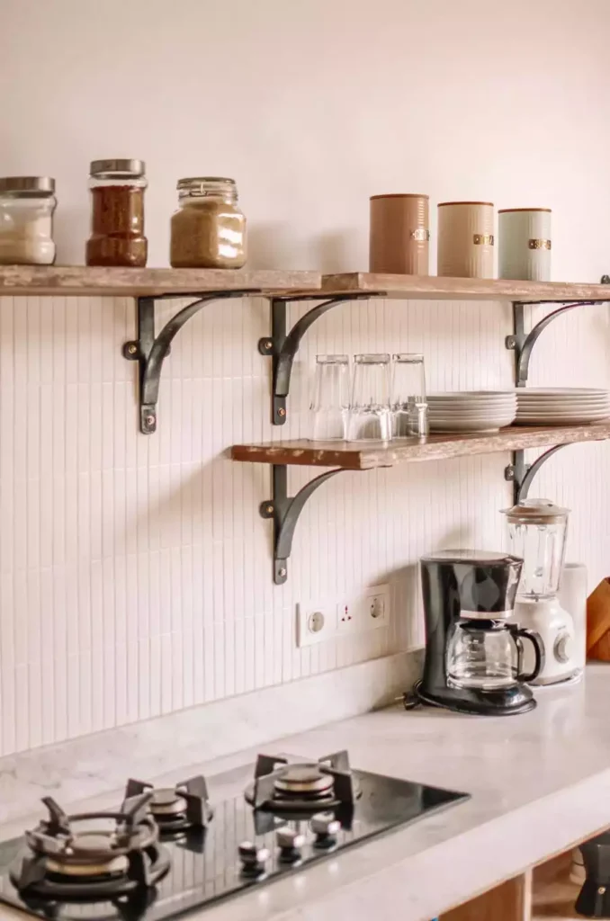 Rustic Open Shelves With Iron Brackets Hold Jars And Glasses For Farmhouse Kitchen Wall Decor