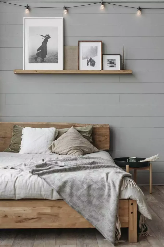 Shiplap Accent Wall With Floating Shelf And Framed Decor