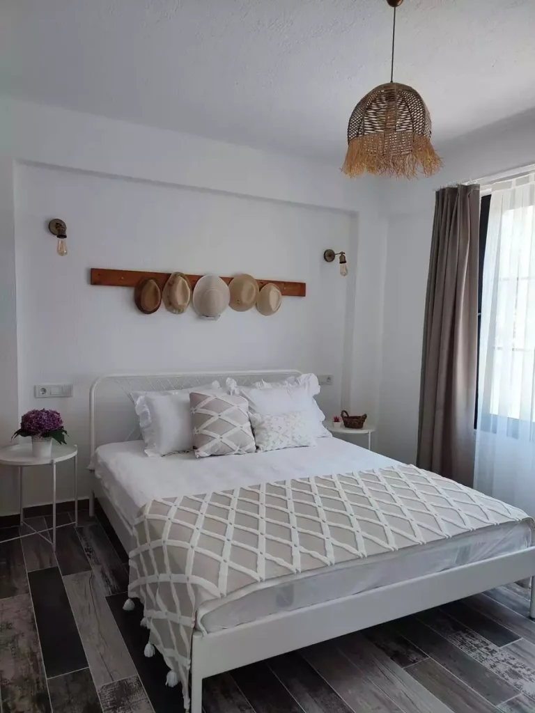 Simple Gray Behind The Bed Wall Decor With A Statement Pendant Light