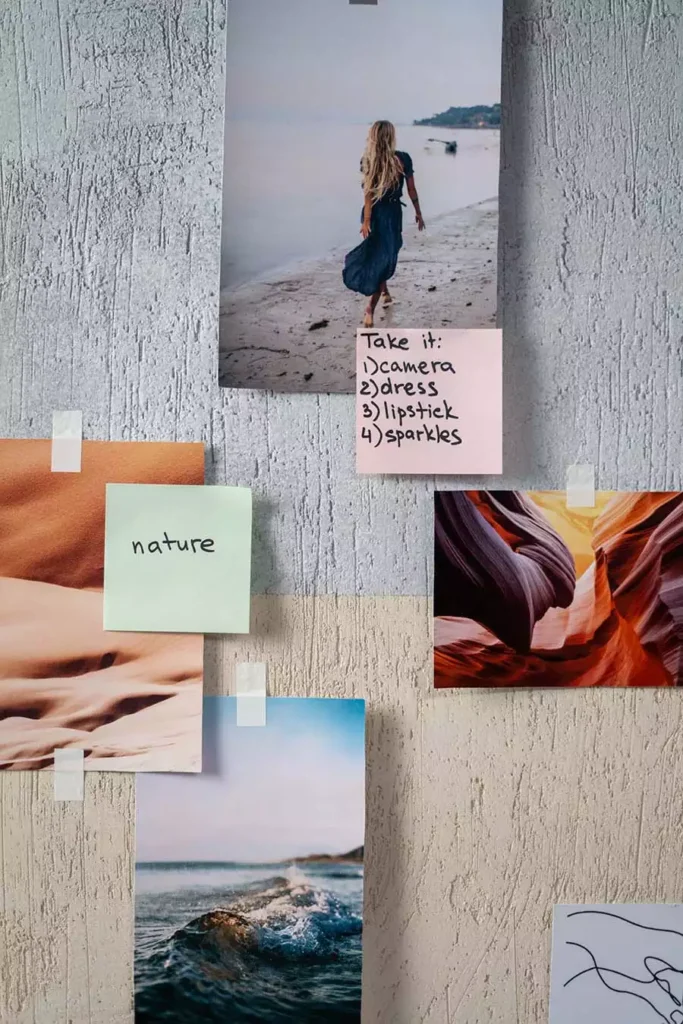 Sticky Notes Wall Mood Board with Taped Nature Photos and a Handwritten Packing List Note