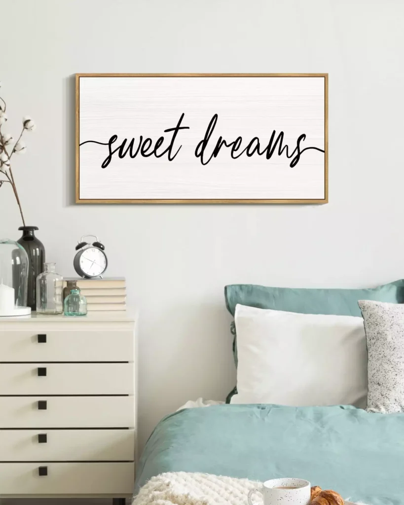 Sweet Dreams framed script sign as simple over the bed wall decor above a teal bed