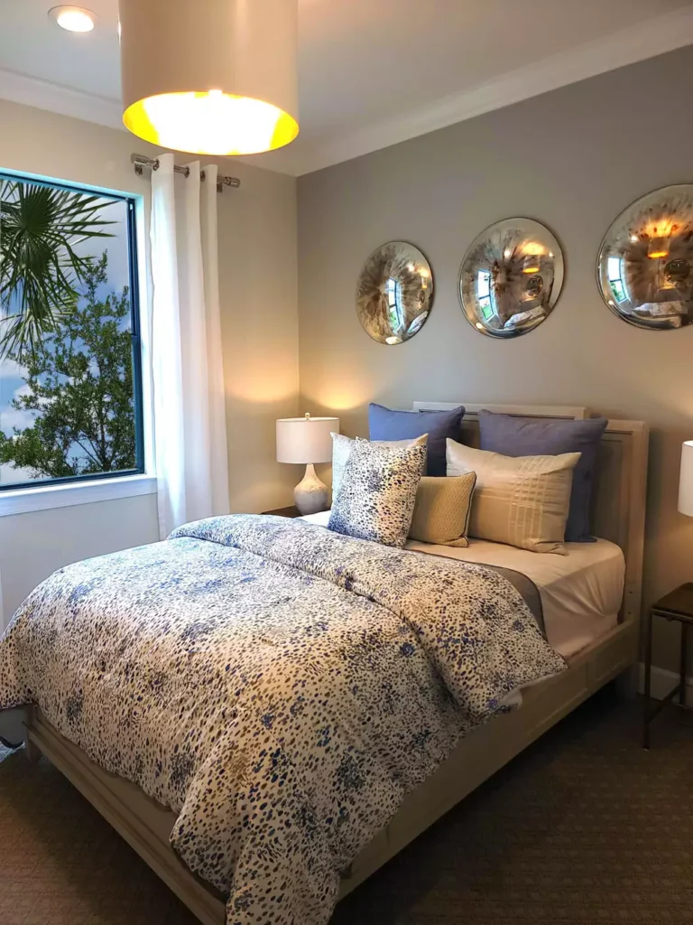 Trio of round convex mirrors as reflective over the bed wall decor