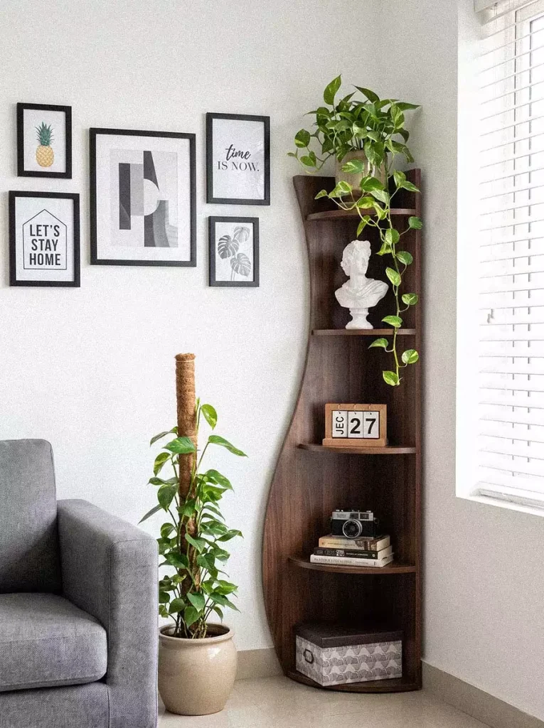 Walnut Corner Wall Shelf Decor Set Beside A Framed Gallery Wall