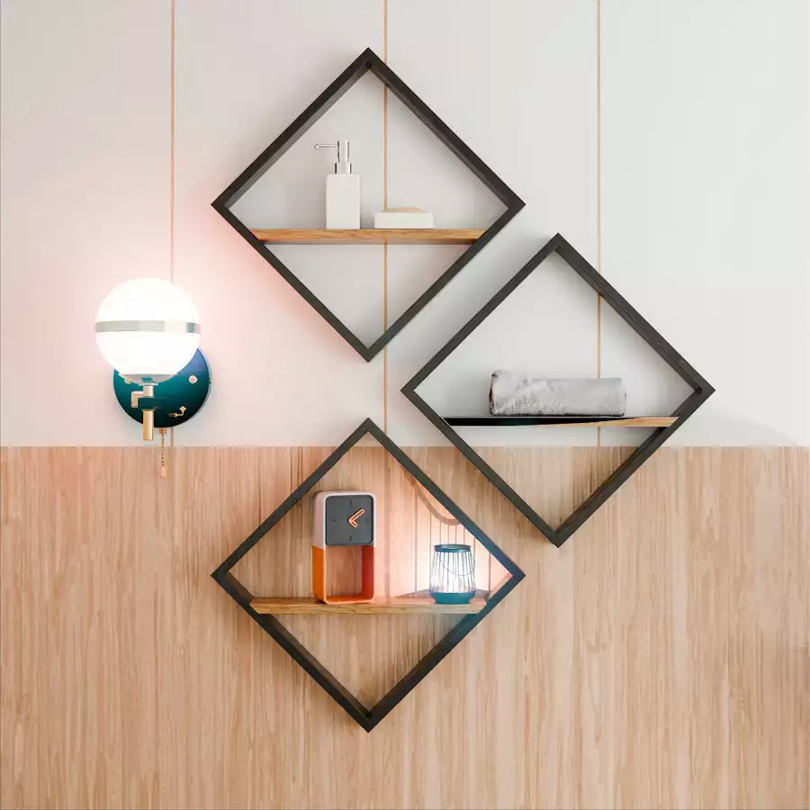 Black diamond-shaped wall shelves beside a globe sconce above wood paneling