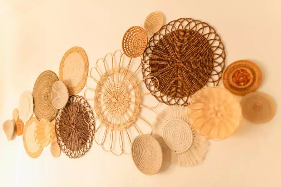 Layered woven wall decor with petal edged baskets