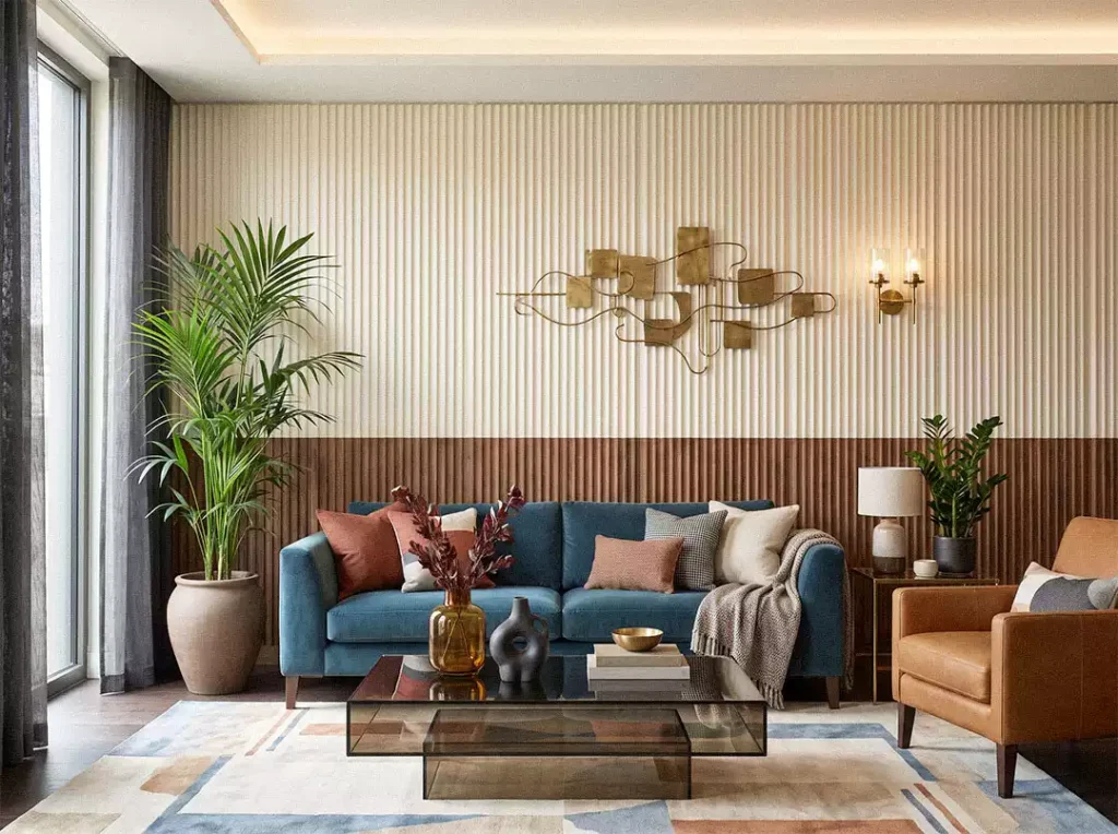Living room with two-tone ivory and walnut fluted wall panels, brass wall sculpture, teal sofa, and caramel leather chair