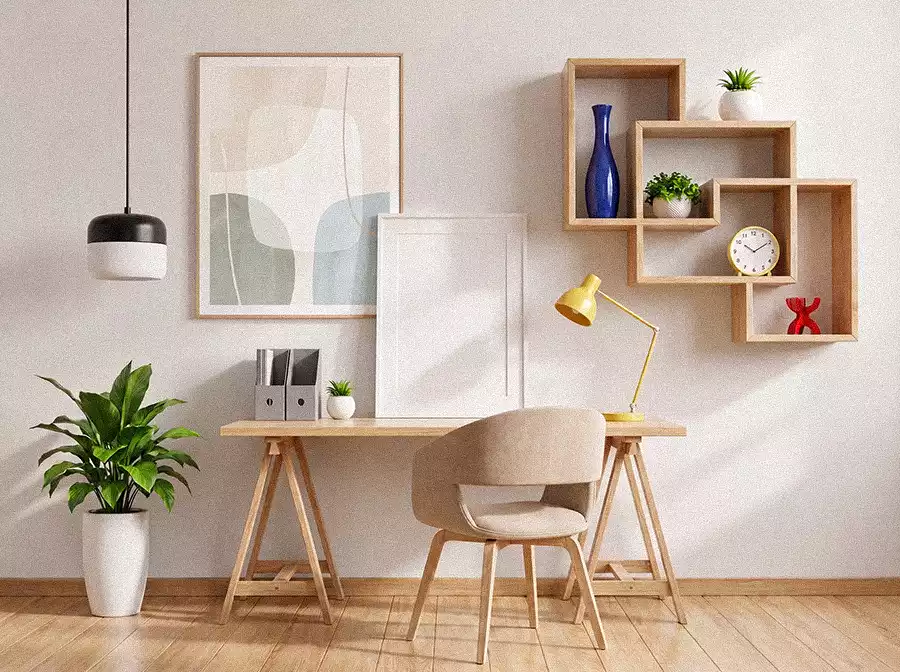Study Wall Decor With Framed Abstract Artwork And Connected Wooden Box Shelves Above A Light Wood Desk